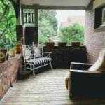brown and white wicker armchairs